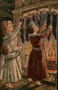 1907 illustrated postcard showing three young girls hanging stockings by a fire. This image aids the visual of "hanging the stockings by the chimney with care"