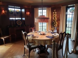 Lucknow dining room set for dinner and decorated for Christmas