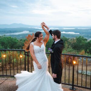 Newly wedded couple taking a spin on the terrace overlooking Lake Winnipesaukee